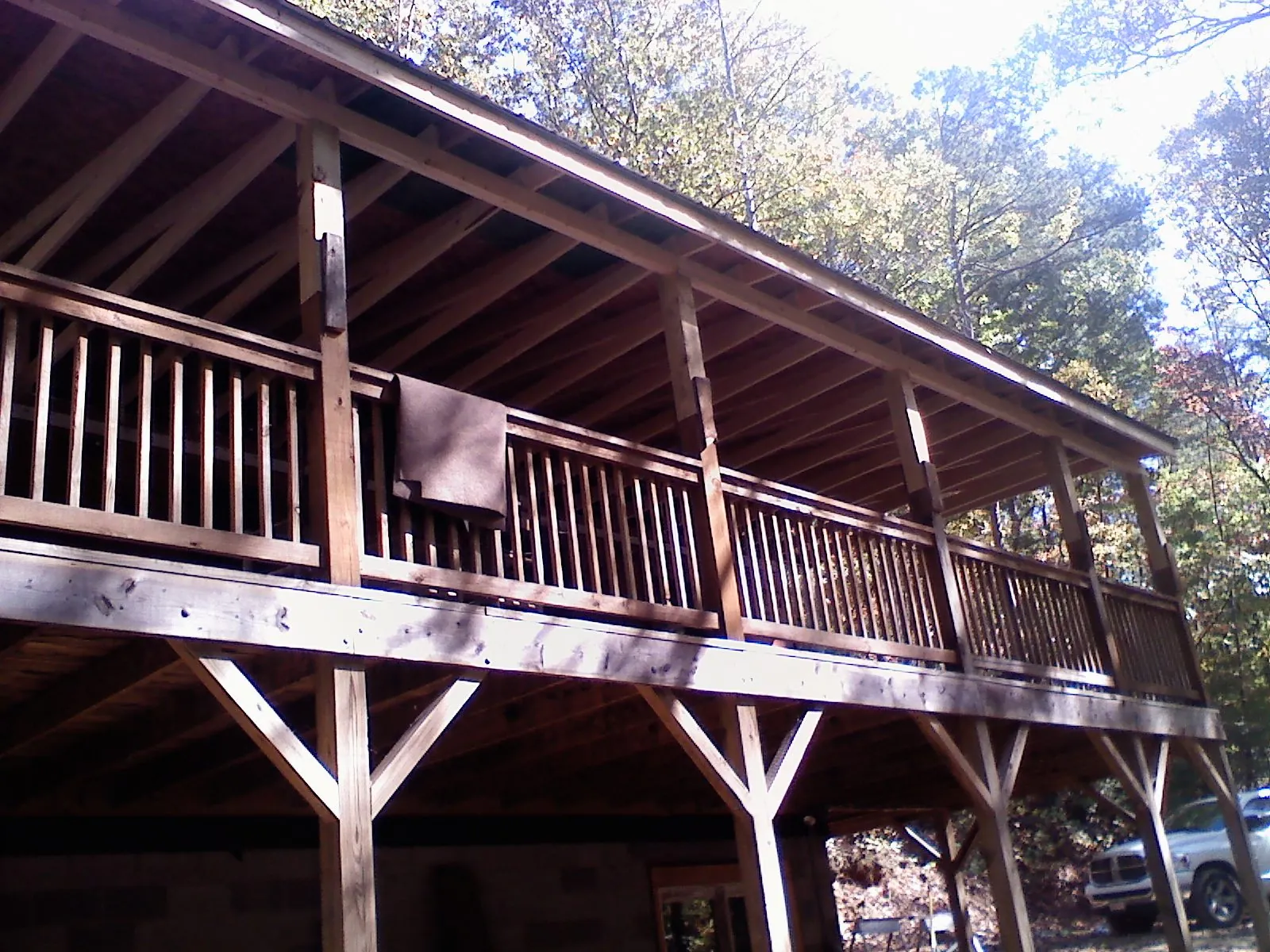 Timber framing under a new elevated porch and deck — Roof Leak Repair in Macedonia by Roofing Brothers